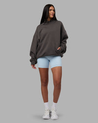 Woman wearing MVP Oversized Hoodie - Dark Storm | Model:Rhiley | Size:L