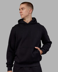 Man wearing MVP Regular Fit Hoodie - Black | Model:Tom | Size:L