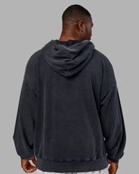 Man wearing MVP Washed Terry Oversized Hoodie - Black Washed | Model:Sam | Size:L