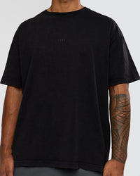 Man wearing Memory in Motion Heavyweight Oversized Tee - Black Washed | Model:Xav | Size:L