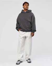 Man wearing Memory In Motion Ultra Heavyweight Washed Hoodie - Dark Storm Washed | Model:Xav | Size:L