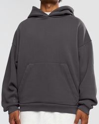 Man wearing Memory In Motion Ultra Heavyweight Washed Hoodie - Dark Storm Washed | Model:Xav | Size:L