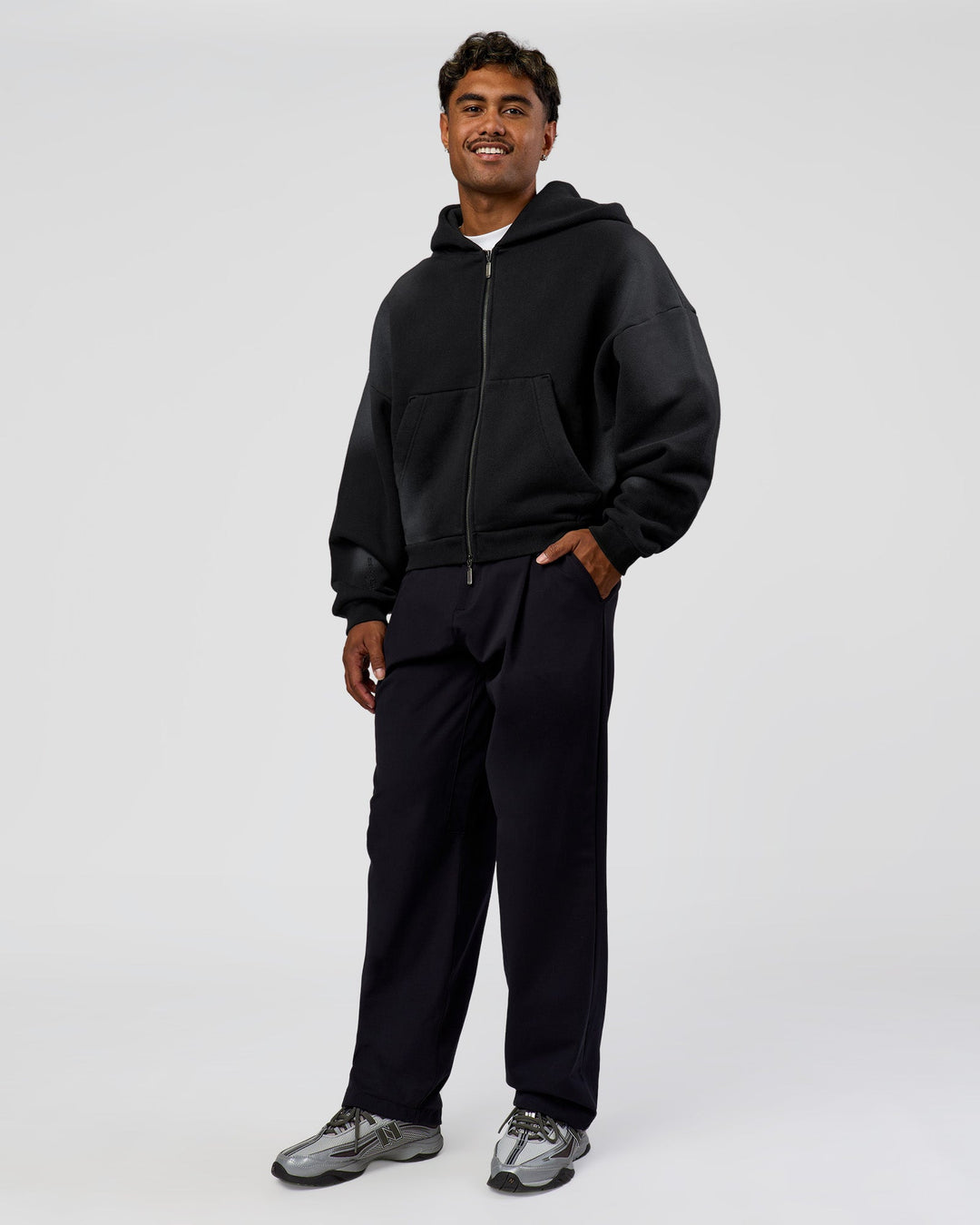 Man wearing Memory in Motion Ultra Heavyweight Zip Thru Hoodie - Black Washed | Model:Xav | Size:L