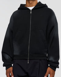 Man wearing Memory in Motion Ultra Heavyweight Zip Thru Hoodie - Black Washed | Model:Xav | Size:L
