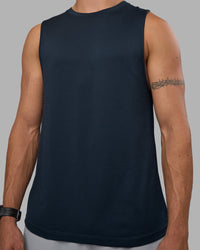 Man wearing AeroFLX+ Seamless Muscle Tank - Navy/Navy | Model:Nikola | Size:L