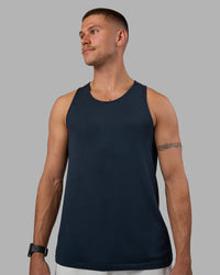 Man wearing AeroFLX+ Seamless Tank - Navy/Navy | Model:Nikola | Size:L
