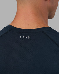Man wearing AeroFLX+ Seamless Tee - Navy/Navy | Model:Nikola | Size:L