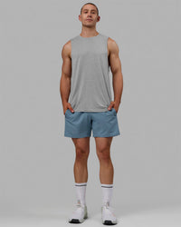 Wan wearing AeroFLX+ Seamless Muscle Tank - Light Grey Marl