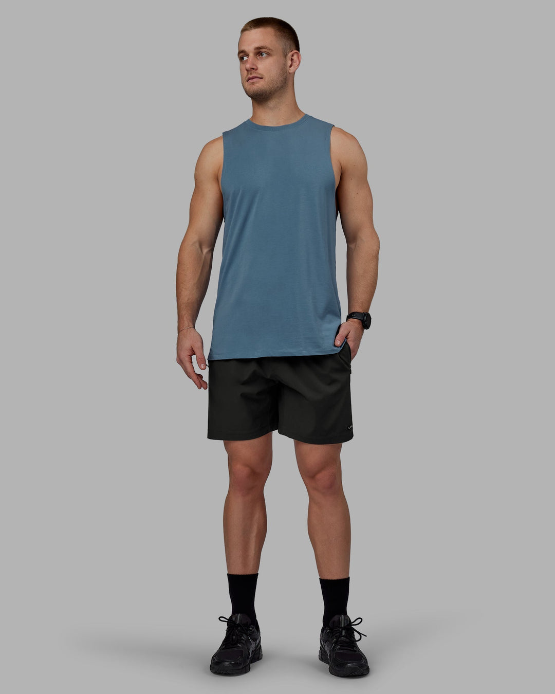 Man wearing Deluxe PimaFLX Tank - Elemental Blue