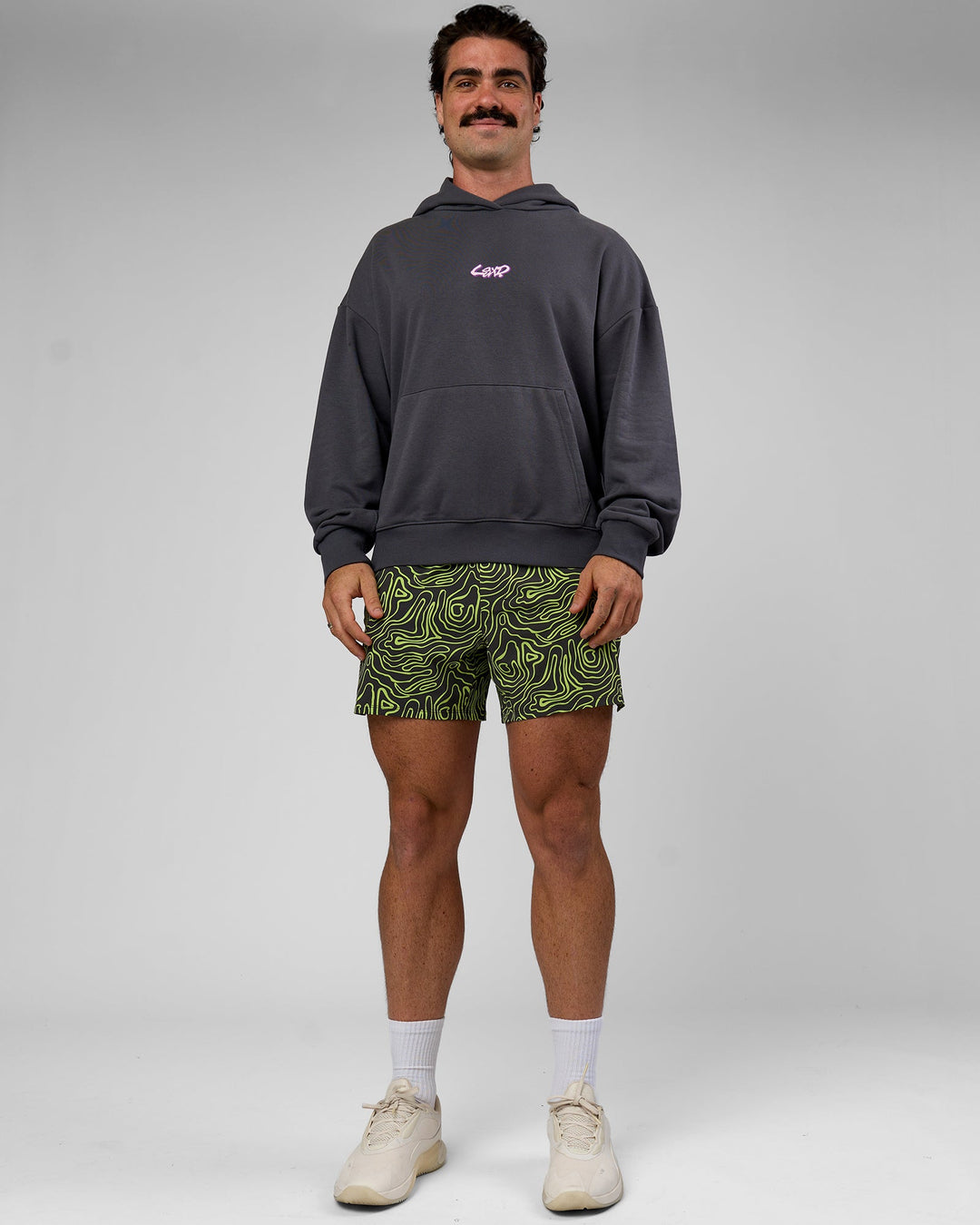 Man wearing Miami Vibe Oversized Hoodie - Dark Storm-Marshmallow | Model:Adam | Size:L