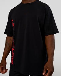 Man wearing Nothing Is Impossible FLXCotton Oversized Tee - Black-Flame | Model:Sam | Size:L