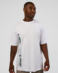 Man wearing Nothing Is Impossible FLXCotton Oversized Tee - White-Vital Green | Model:Sam | Size:L