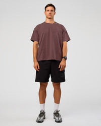 Man wearing Offset Heavyweight Unisex Oversized Tee - Cocoa Powder-Cocoa Powder | Model:Liam | Size:L