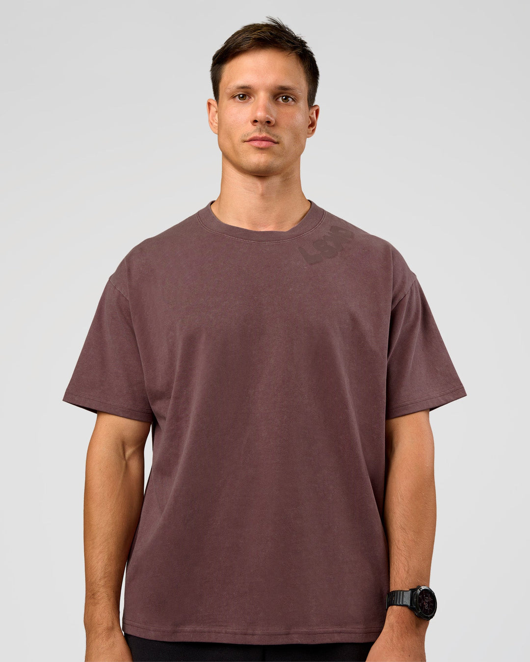 Man wearing Offset Heavyweight Unisex Oversized Tee - Cocoa Powder-Cocoa Powder | Model:Liam | Size:L