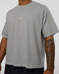 Man wearing Oversized Heavyweight Boxed Tee - Light Grey Marl | Model:Xav | Size:L