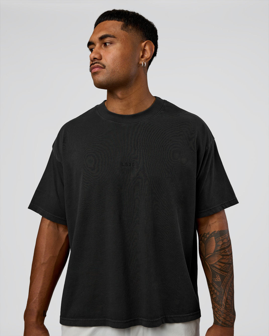 Man wearing Oversized Heavyweight Boxed Tee - Washed Black | Model:Xav | Size:L