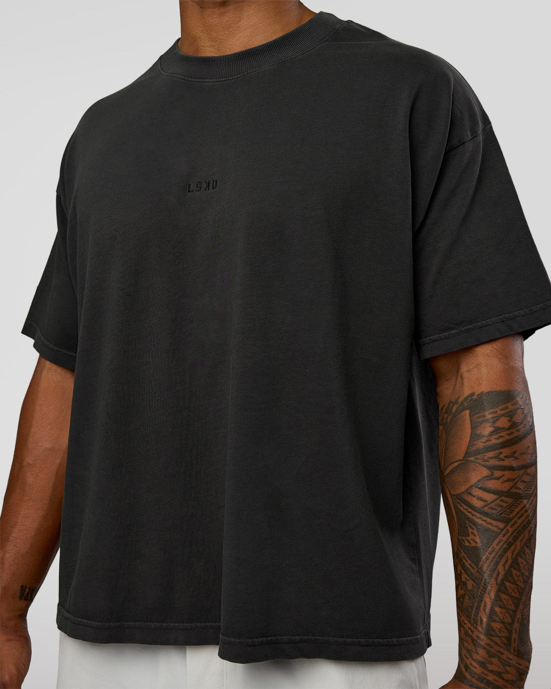 Man wearing Oversized Heavyweight Boxed Tee - Washed Black | Model:Xav | Size:L