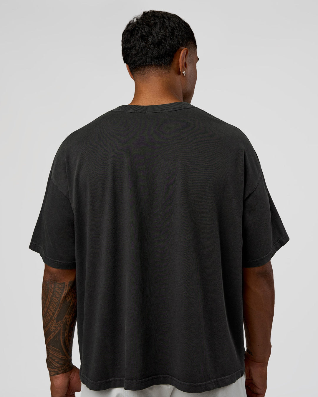Man wearing Oversized Heavyweight Boxed Tee - Washed Black | Model:Xav | Size:L