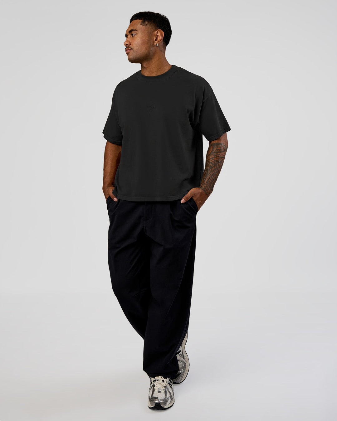 Man wearing Oversized Heavyweight Boxed Tee - Washed Black | Model:Xav | Size:L