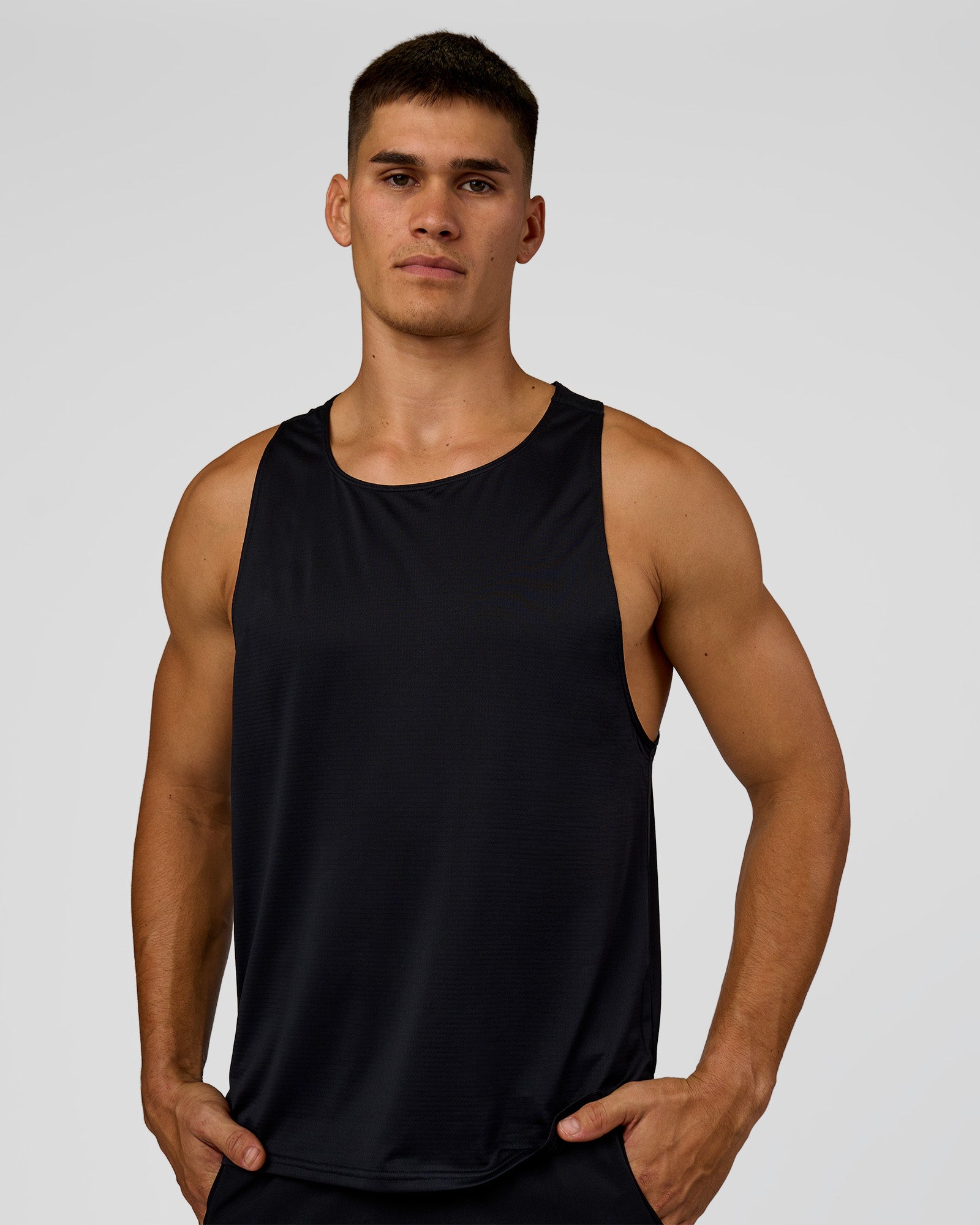Man wearing Pace Running Tank 3.0  - Black | Model:Jackson | Size:L