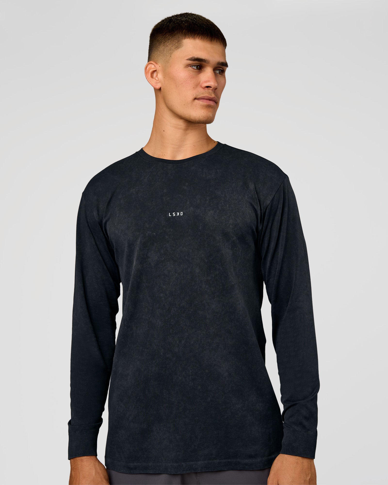 Man wearing Power Oversized Long Sleeve Tee - Black Washed | Model:Jackson | Size:L