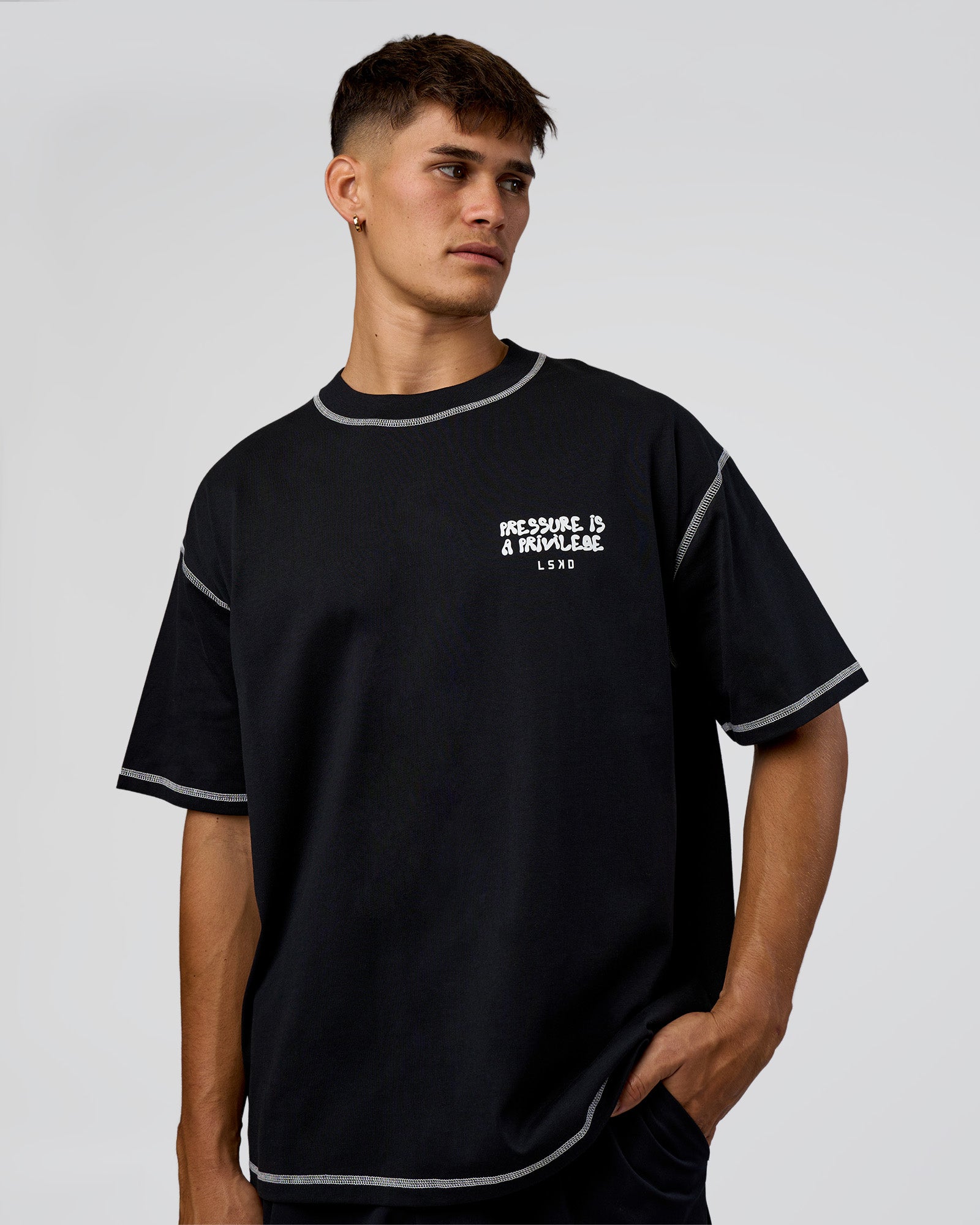 Man wearing Pressure is Privilege Oversized Tee - Black-White | Model:Jackson | Size:L