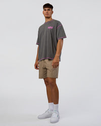 Man wearing Pressure is Privilege Oversized Tee - Dark Storm Washed-Ultra Fuchsia | Model:Jackson | Size:L