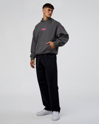 Man wearing Pressure is Privilege Oversized Hoodie - Dark Storm-Ultra Fuchsia | Model:Jackson | Size:L