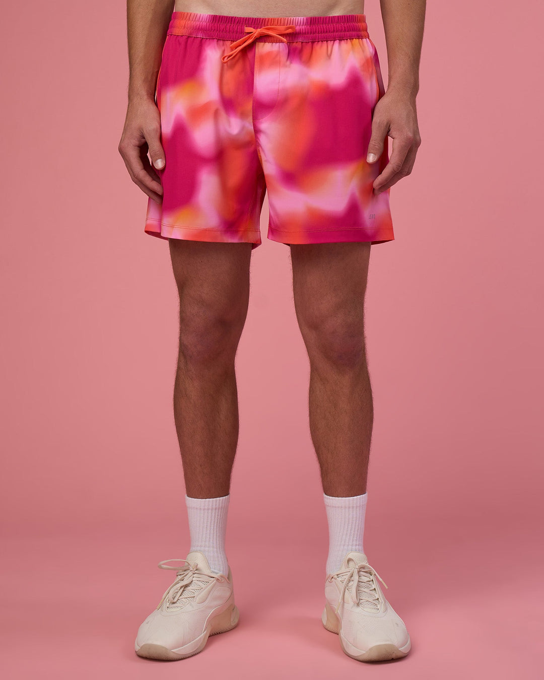 Man wearing Rep 5&quot; Performance Short - Pink Glow Print | Model:Brandon | Size:L