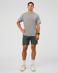 Man wearing Rep 7'' Performance Short - Carbon Green | Model:Liam | Size:L