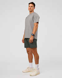 Man wearing Rep 7'' Performance Short - Carbon Green | Model:Liam | Size:L