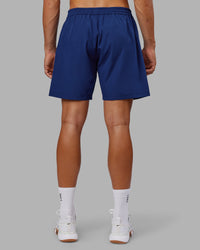 Man wearing Rep 7'' Performance Short - Midnight Blue | Model:Jackson | Size:L