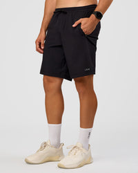 Man wearing Rep 9'' Training Short - Black | Model:Liam | Size:L