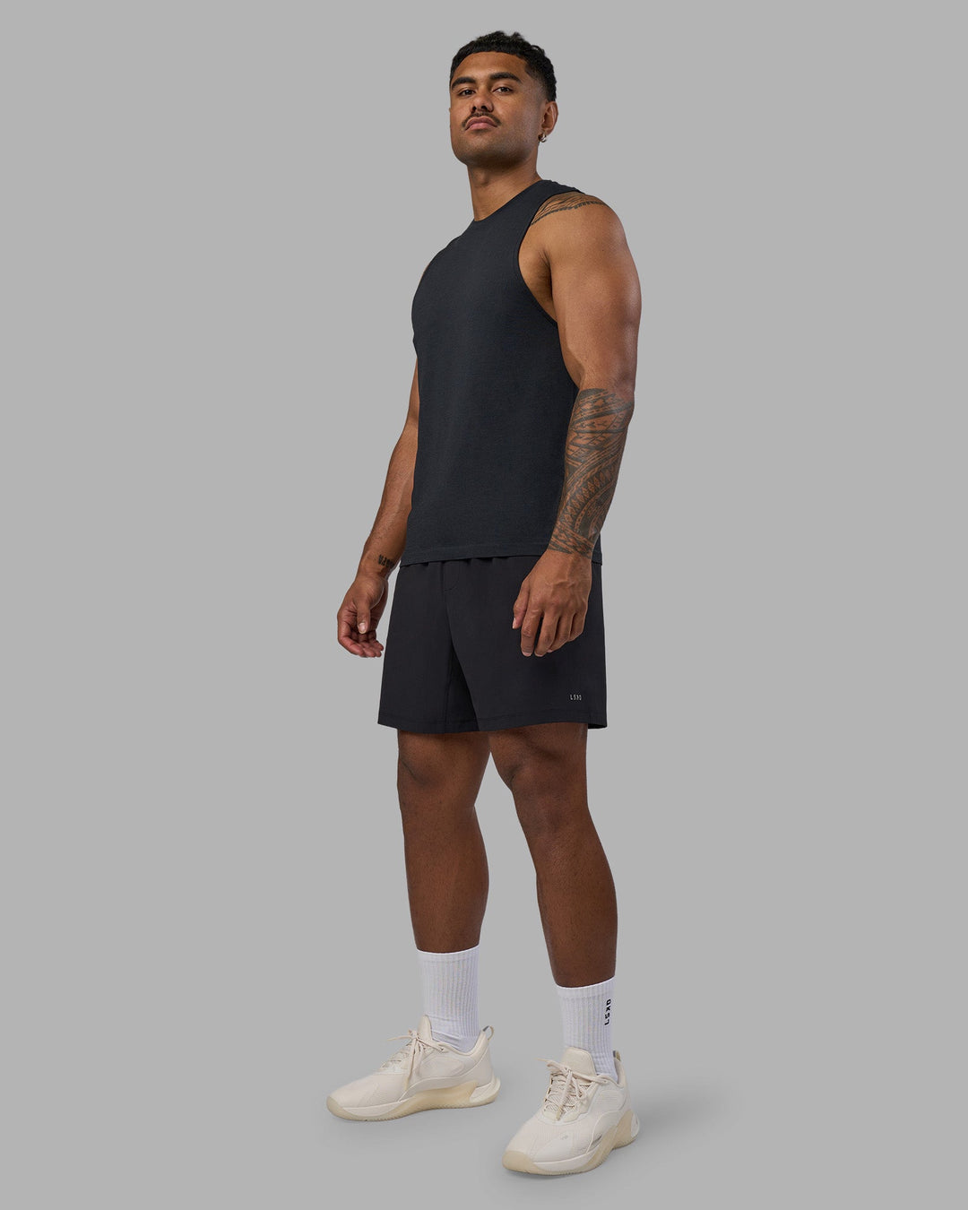 Man wearing Rep TRD Ripstop 7" Training Short - Black | Model:Xav | Size:L