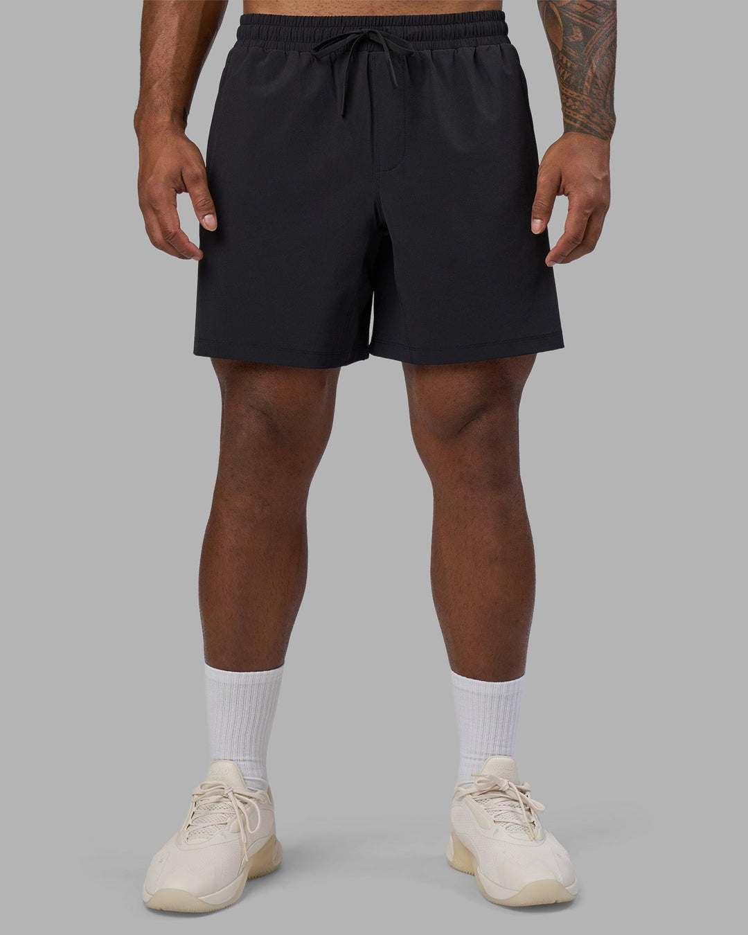 Man wearing Rep TRD Ripstop 7" Training Short - Black | Model:Xav | Size:L