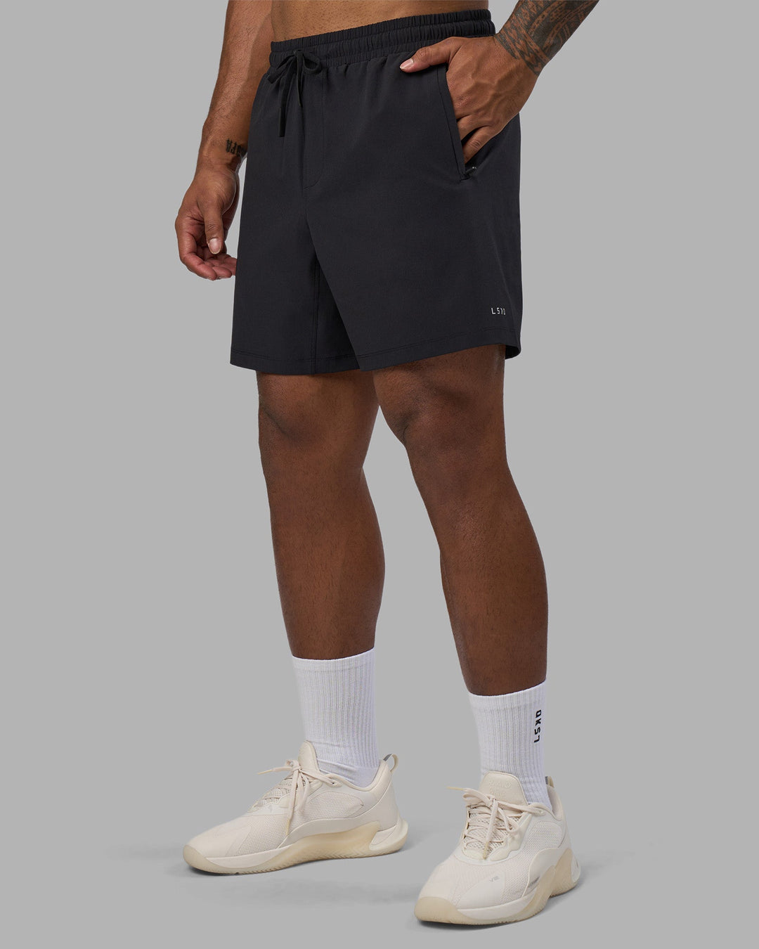 Man wearing Rep TRD Ripstop 7" Training Short - Black | Model:Xav | Size:L