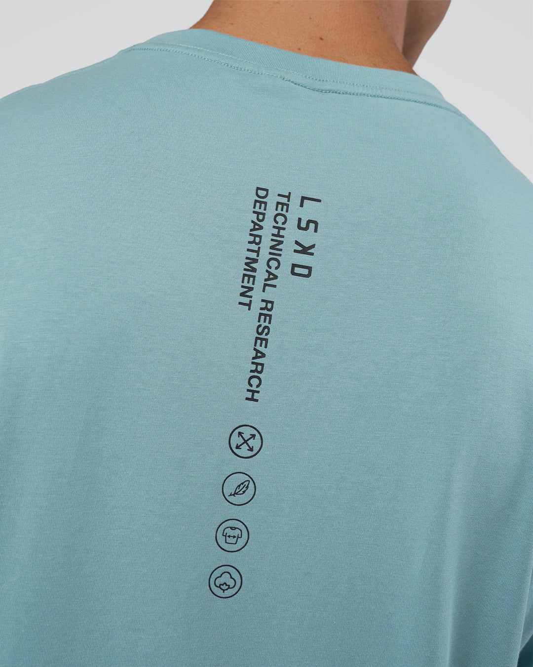 Man wearing Research Department FLXCotton Oversized Tee - Smoke Blue | Model:Nikola | Size:L