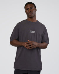 Man wearing Runner's FLXCotton Oversized Tee - Black Washed-White | Model:Paabio | Size:L