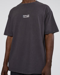 Man wearing Runner's FLXCotton Oversized Tee - Black Washed-White | Model:Paabio | Size:L