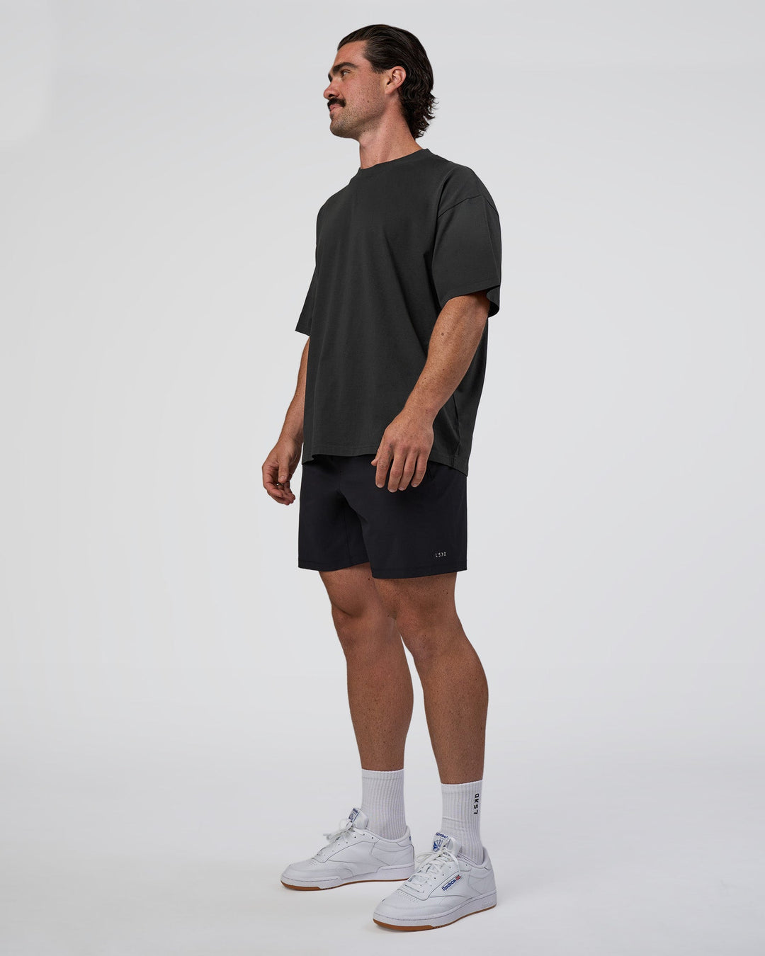 Man wearing Spray Heavyweight Unisex Oversized Tee - Charcoal Washed | Model:Adam | Size:L