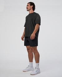 Man wearing Spray Heavyweight Unisex Oversized Tee - Charcoal Washed | Model:Adam | Size:L