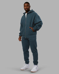 Man wearing Stream Oversized Panel Zip Hoodie - Deep Sea | Model:Sam | Size:L