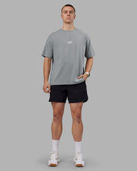 Man wearing Time's Up Heavyweight Oversized Tee - Circular Grey-White | Model:Tom | Size:L