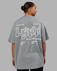 Woman wearing Time's Up Heavyweight Oversized Tee - Circular Grey-White | Model:Ayla | Size:L