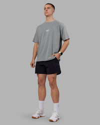 Man wearing Time's Up Heavyweight Oversized Tee - Circular Grey-White | Model:Tom | Size:L
