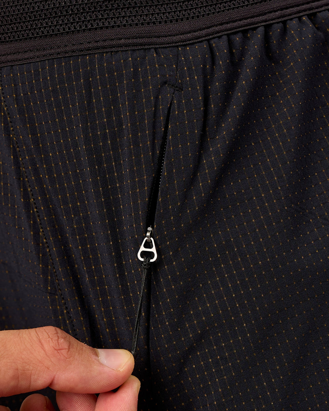 Man wearing UltraAir 5" Lined Performance Short  - Black-Reflective | Model:Liam | Size:L