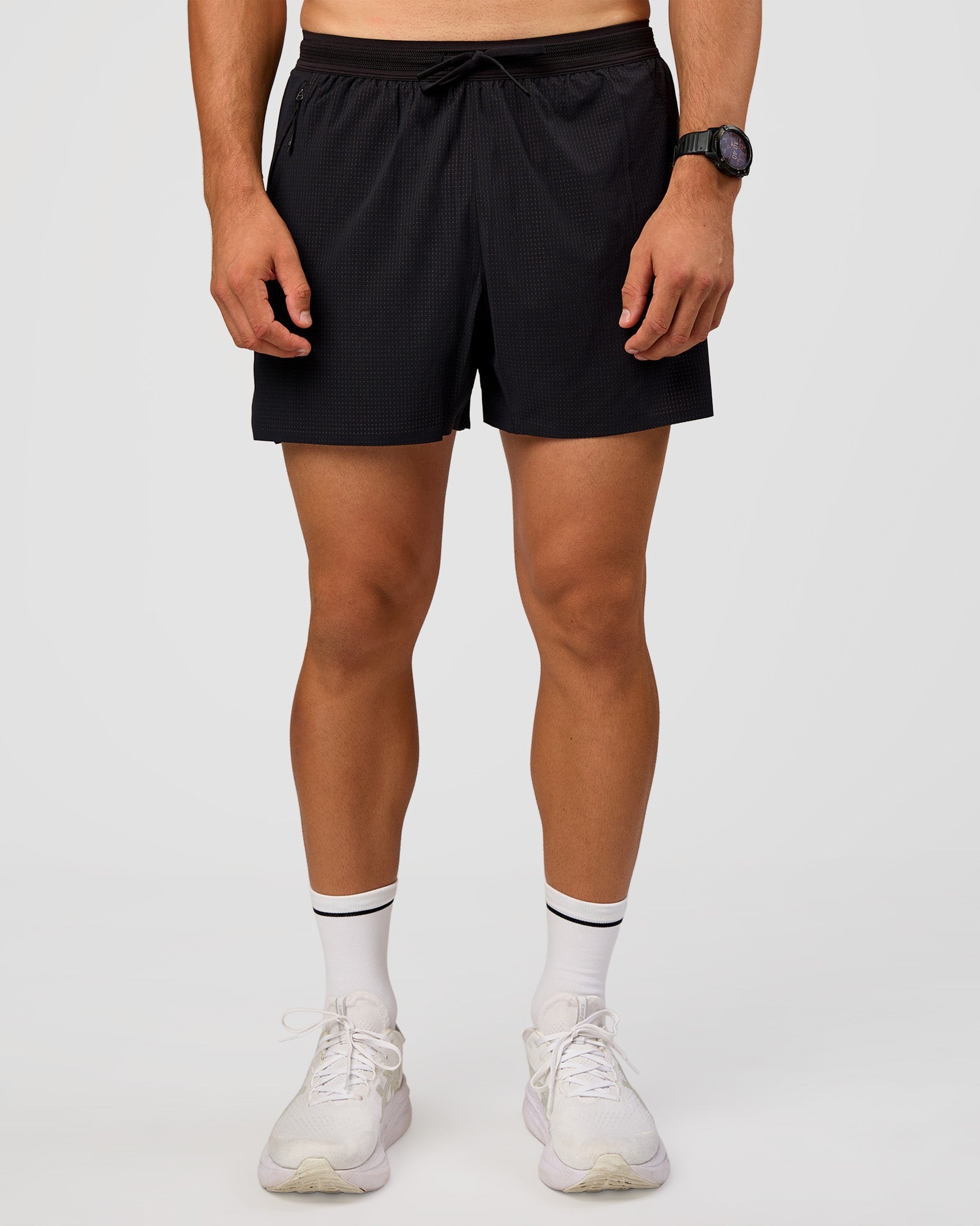 Man wearing UltraAir 5" Lined Performance Short  - Black-Reflective | Model:Liam | Size:L