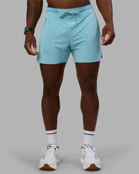 Man wearing UltraAir 5" Lined Performance Short - Retro Blue | Model:Sam | Size:L