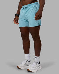 Man wearing UltraAir 5" Lined Performance Short - Retro Blue | Model:Sam | Size:L