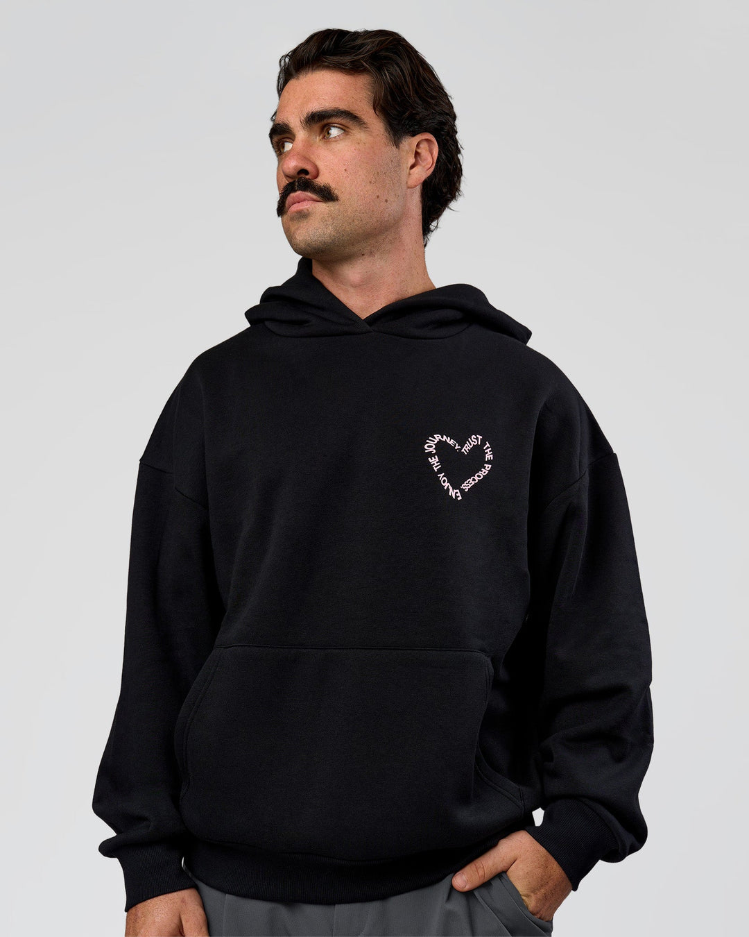 Man wearing Unisex Love The Process Oversize Hoodie - Black-Marshmallow | Model:Adam | Size:L